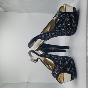 Brand Unknown, Black, Rhinestone, 5 inch heel pumps. Size 8,